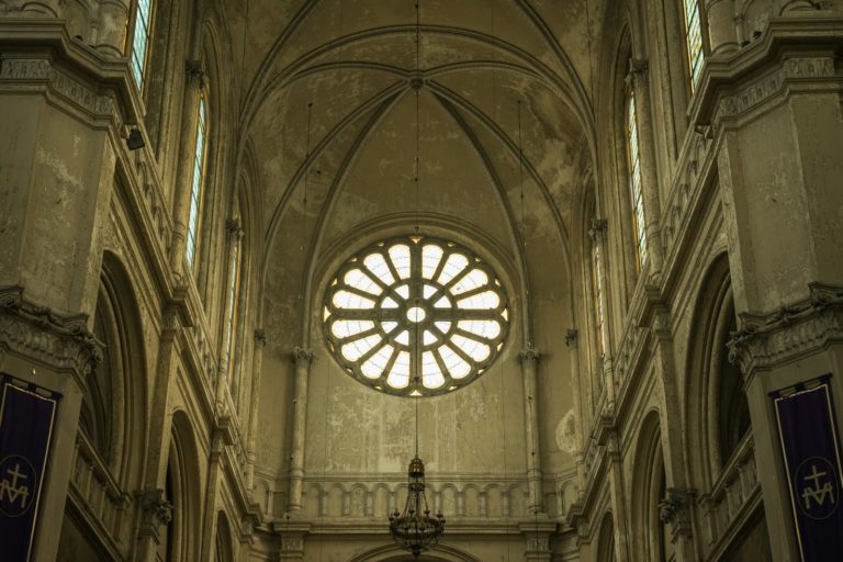 a large cathedral with a big round window